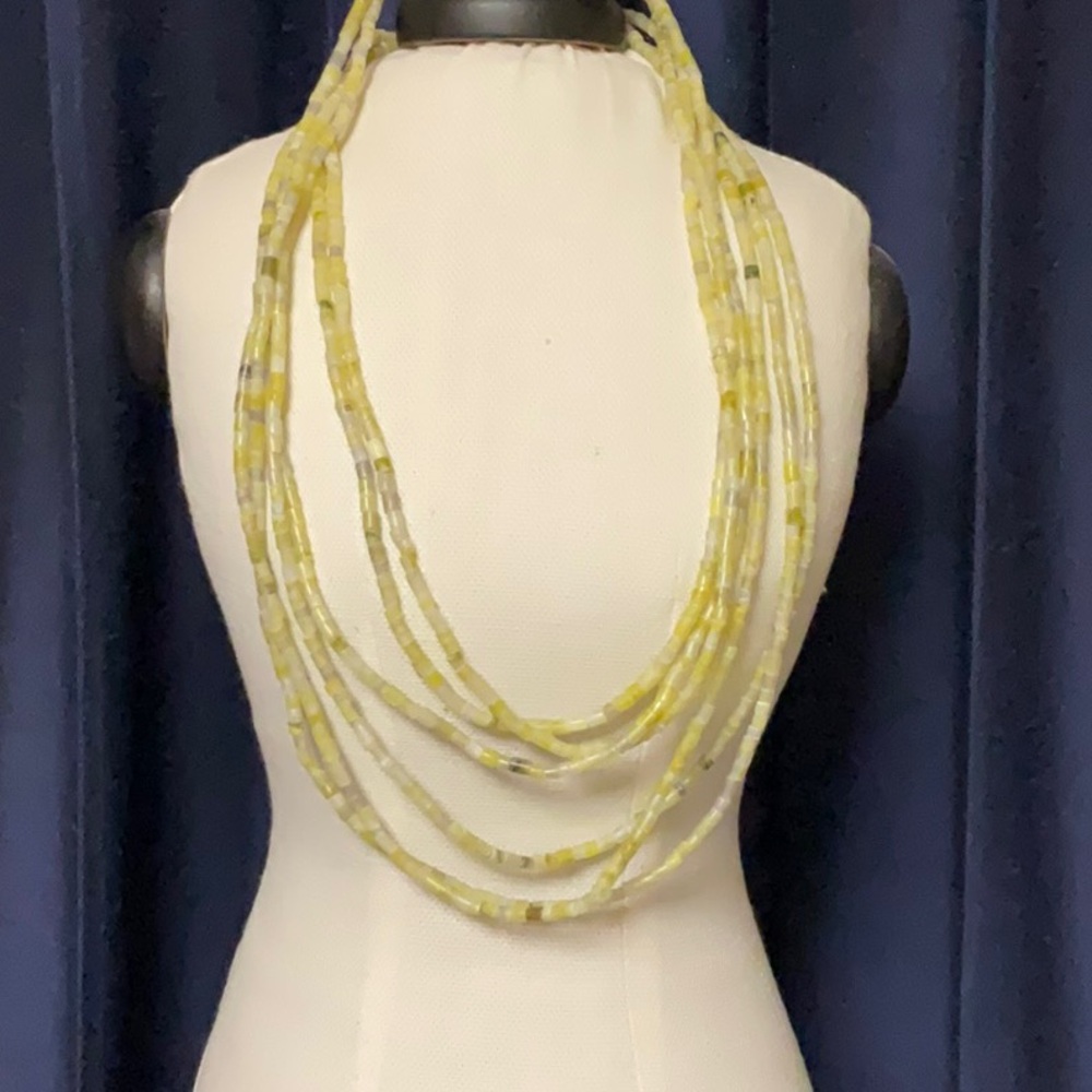 Three strands, 39 inches, tube beads